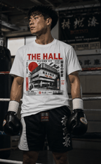 Boxer wearing The Hall white Japanese boxing T-shirt in a boxing gym