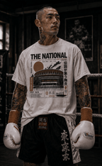 Boxer wearing The National white Japanese boxing T-shirt in a boxing gym